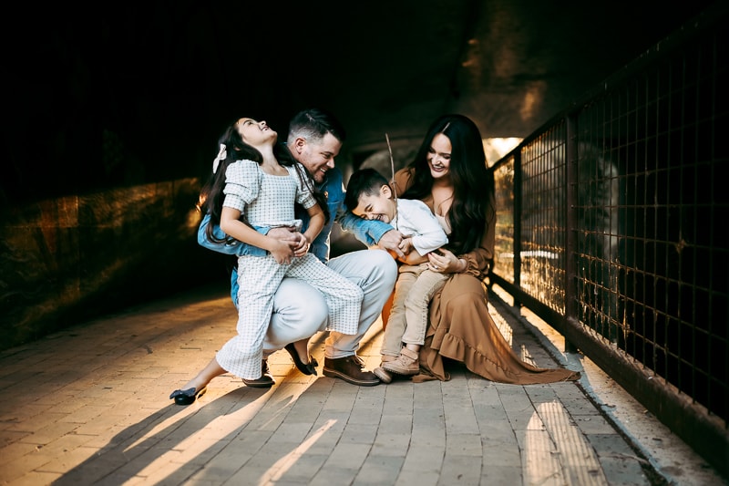 a family in a tunnel with natural light
