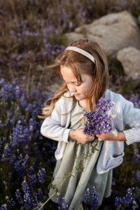 little girl with wildflowers 